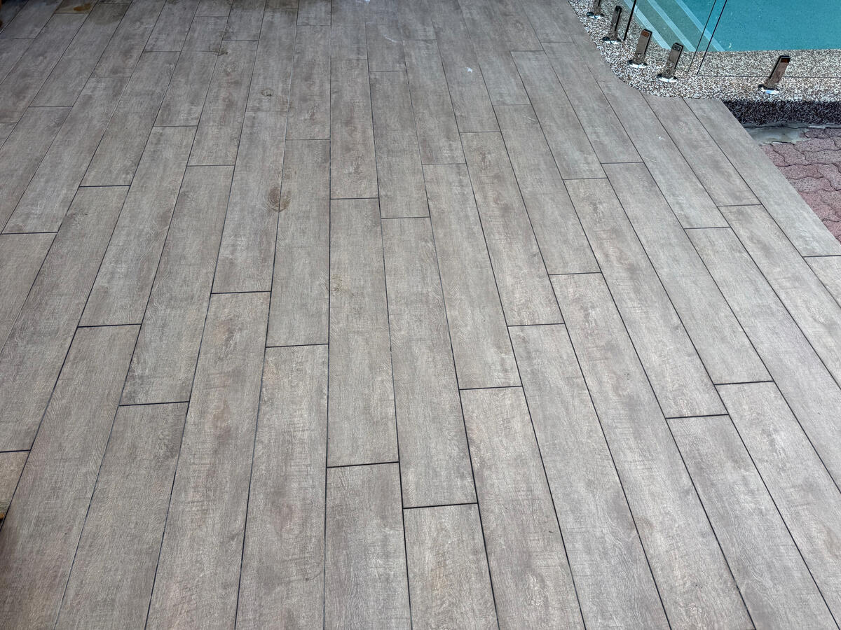 Timber-look tile pool deck — after soft wash